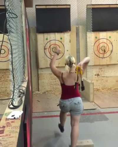 A girl with a rare triple axe