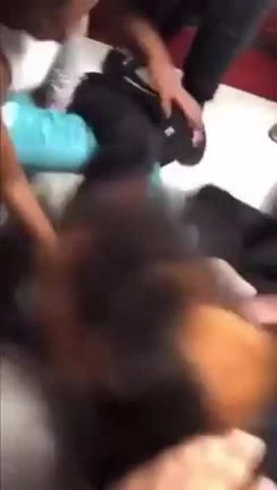 White girl gets beaten by an angry mob