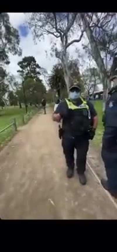 Melbourne Police grab a man's coffee to check if there was any left. If not, he would have been fined for not wearing a mask.