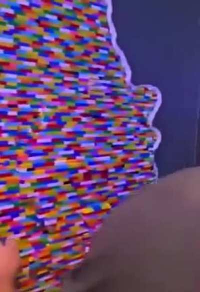 A lego wall with hidden doors