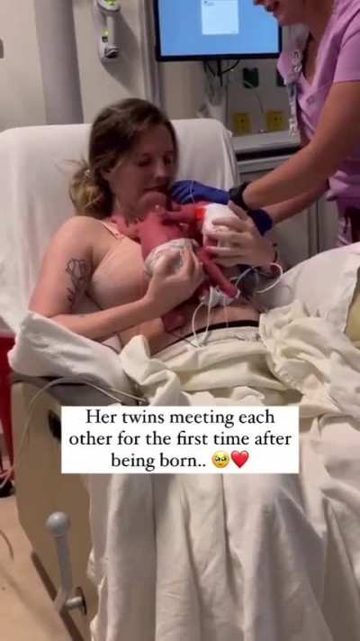 Twins meeting each other for the first time
