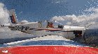 Connie Carter having fun in an airplane [gif]