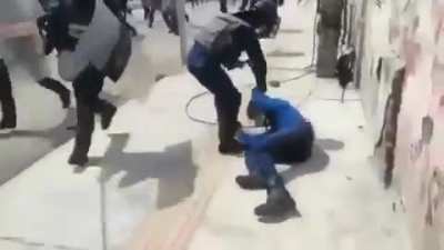 Why hit a police officer like that??.. Stupid youths.. so infuriating