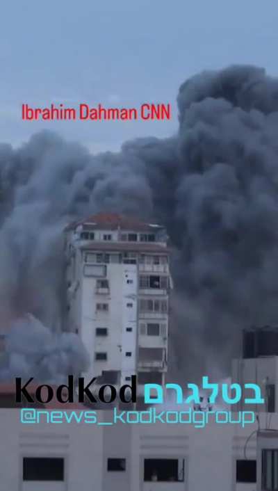IAF strike on a row of high rises, last night in Han Yunnes, Gaza. As usual, the occupants were warned before the buildings were taken down, so the camera was pointed at the building ahead of time.
