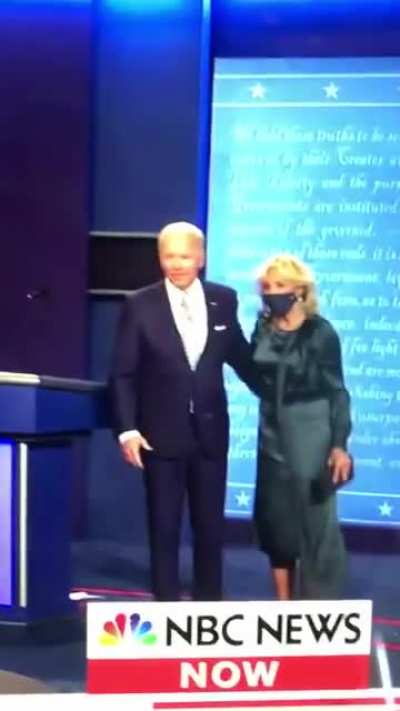 First couple playing hand tug o'war as the Bidens hug post-debate