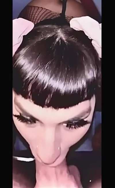 Filling a pigtailed goth’s throat with a thick cock