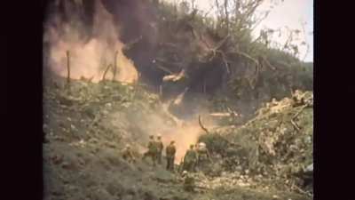 American flame tank incinerates Japanese position. Battle of Okinawa, 1945.