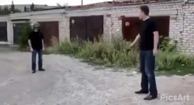 Idiot shooting another idiot wearing a helmet in the head , I think he needs an Aspirin tomorrow