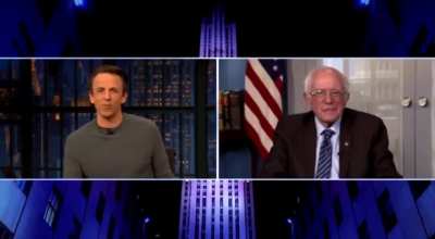 Bernie Sanders reacts to his instantly iconic inauguration look.