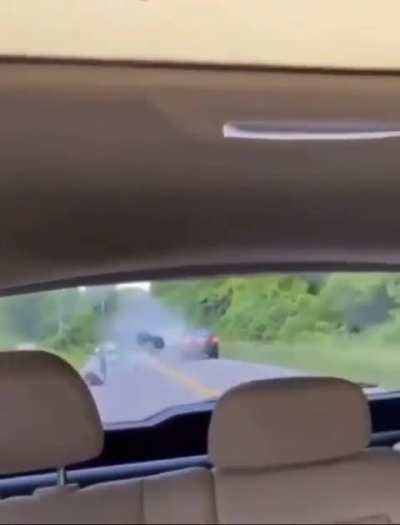 Wheelie lord shows off in a busy road