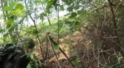 FPV footage shows Russian infantry being attacked by a Ukrainian kamikaze drone in the Kharkov direction. One Russian serviceman was wounded in the leg.
