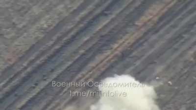 An moving AFU M109 howitzer being hit by Lancet drone. 2023
