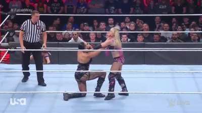 Rhea chokes Alexa then knees her hard in the stomach