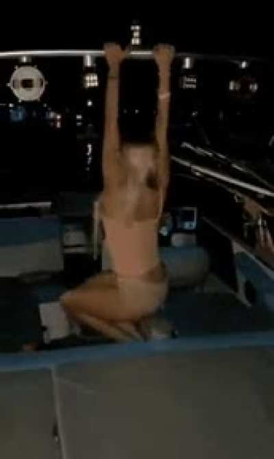 woman do backflip on boat