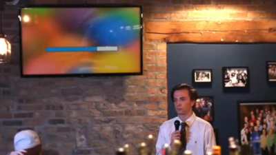 Singing at a karaoke.
