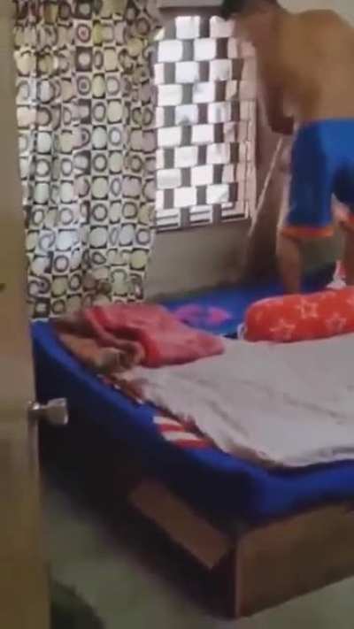 Sweeping out behind the bed