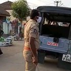 Guy repeatedly hit by Indian policeman, doesn't even blink