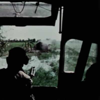 Patrol Air Cushion Vehicle crewman hits a suspected Viet Cong position on the Mekong Delta with a 40mm grenade from an M79 in 1966