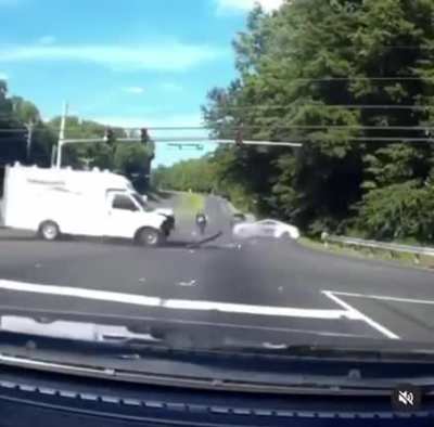 Motorcyclist threads the needle of death