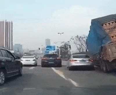 Idiot driver in truck goes for a bank shot but bricks