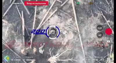 Drone footage of an assault by soldiers of the Russian 6th army on a Ukranian defence line in Kharkov using small arms and grenades. (Casualities visible/music from source(
