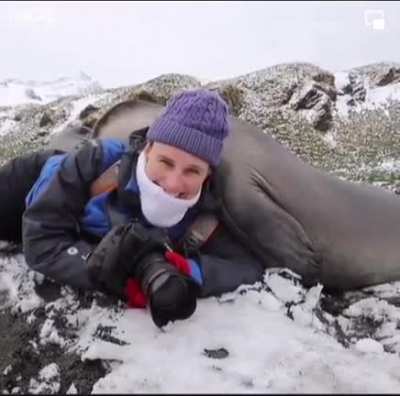 Huddling with a wildlife photographer