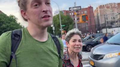 Protestors clash with black woman over road block
