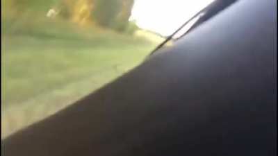 Trying to push a hay bale with your car