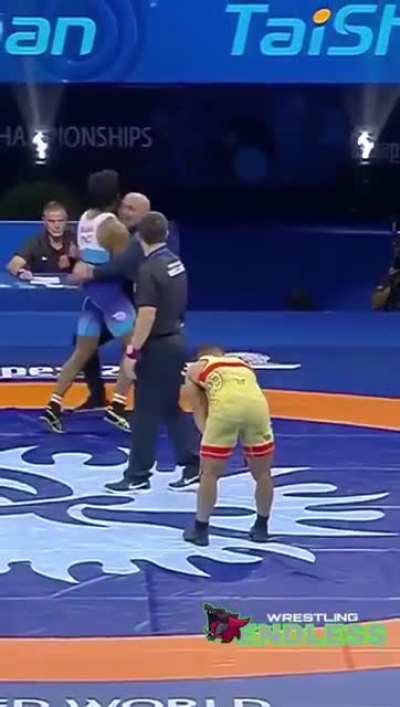 Wrestler celebrates win with coach through belly to belly suplex ᕦ(●__●)ᕤ