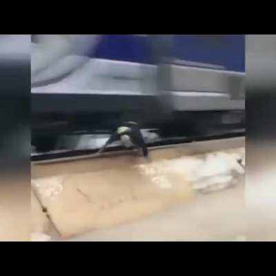 Idiots skate in front of active train tracks