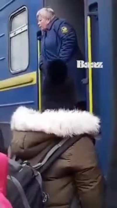 Racist Ukrainians not letting Indian students board train.