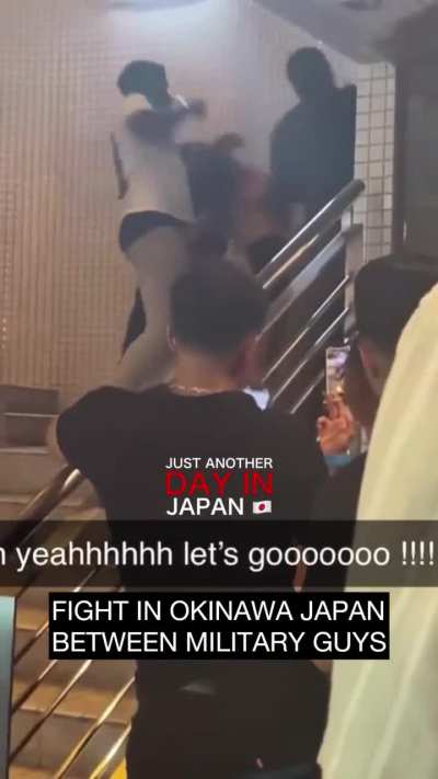 American military guys gang up on one guy near Okinawa and then punch a girl trying to break it up