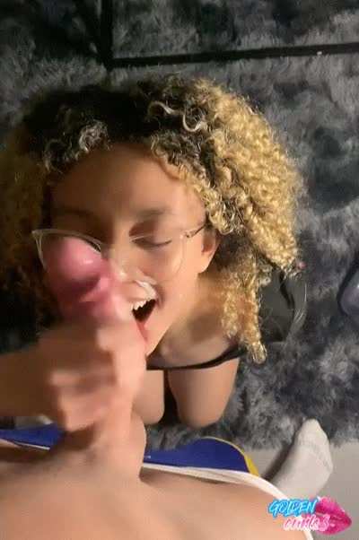 I jerk him off to make him cum on my glasses and my face