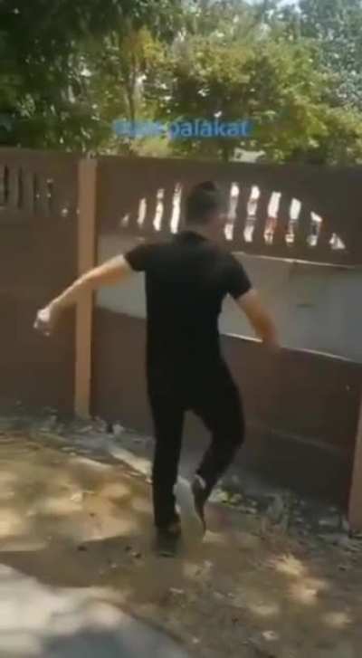 Kicking down a wall.