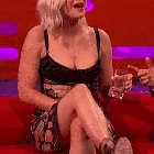 Uncrossing her legs