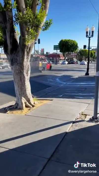 man stopping with one wheel missing