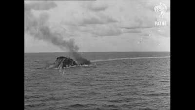 The battleship HMS Barham explodes as she capsizes after being fatally torpedoed, 25 November 1941