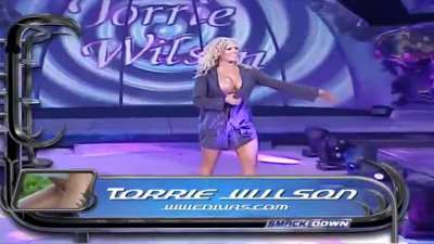 Michael Cole & Tazz's dual response to seeing Torrie coming out, during her entrance for the 