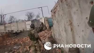 Russian soldier gets his bell rung by a snipers bullet ricocheting off his helmet