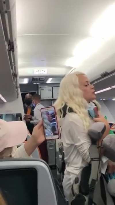 One more video of people refusing to wear mask on a airplane.