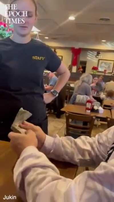 These 3 guys put there money together to rewarded a pregnant waitress with a very generous tip under the Christmas tree for her good work.