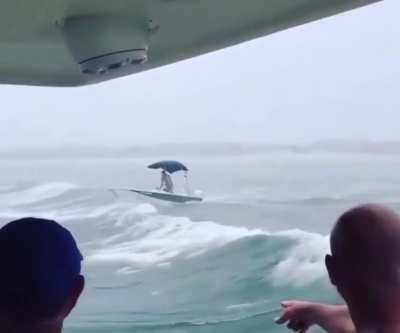 Idiot in Destin FL Riding Waves from Hurricane Sally