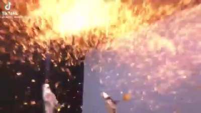 Smacking molten iron with a shovel
