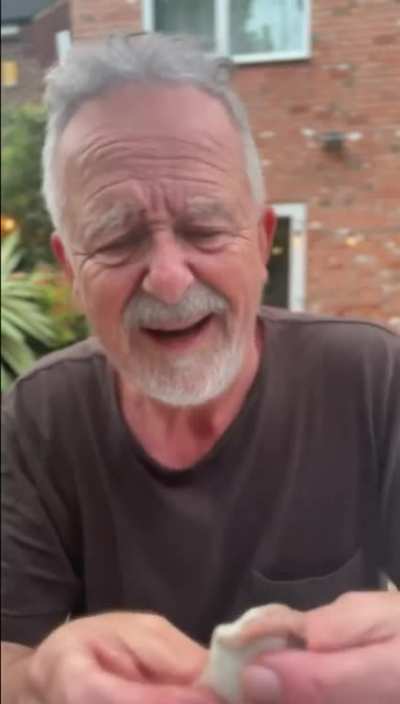British man eating surströmming