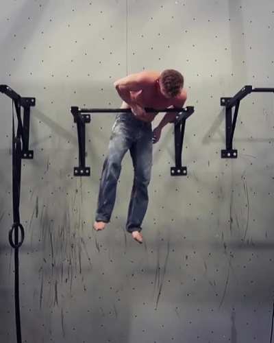 One arm muscle up by rock climber Magnus Midtbø