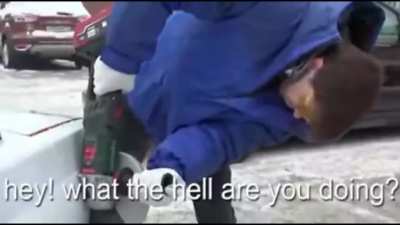 A dude cuts off a piece of a badly parked car so he can park