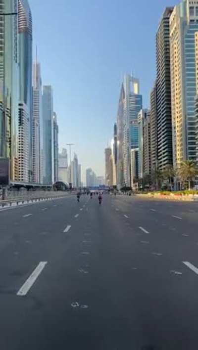 Dubai shuts down both directions of main highway for cycling this morning. WOW!!