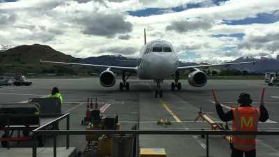 Close up of a Air New Zealand flight arriving into Queenstown