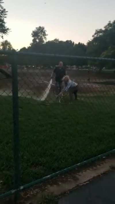 They tried to stop a man from doing his job which is watering the dog park, and they got hosed down as well