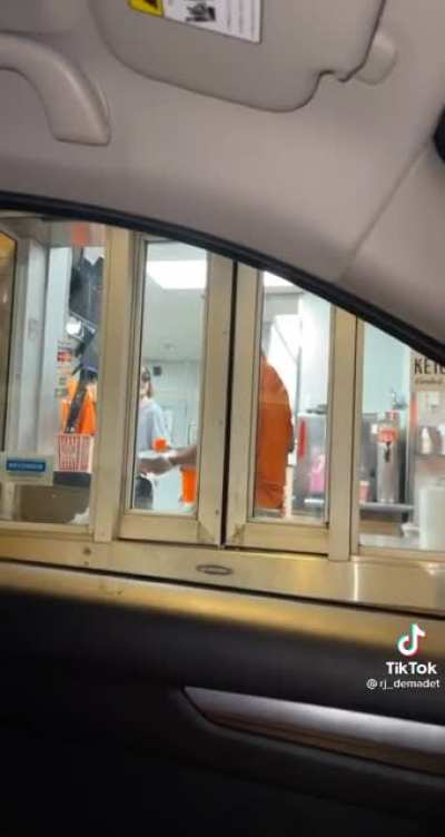 fast food cashier takes gun from customer in drive thru and starts blasting